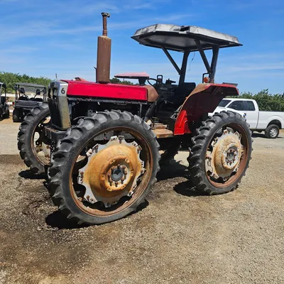 white-farm-equipment-tractor-not-running-ms7vwk8e